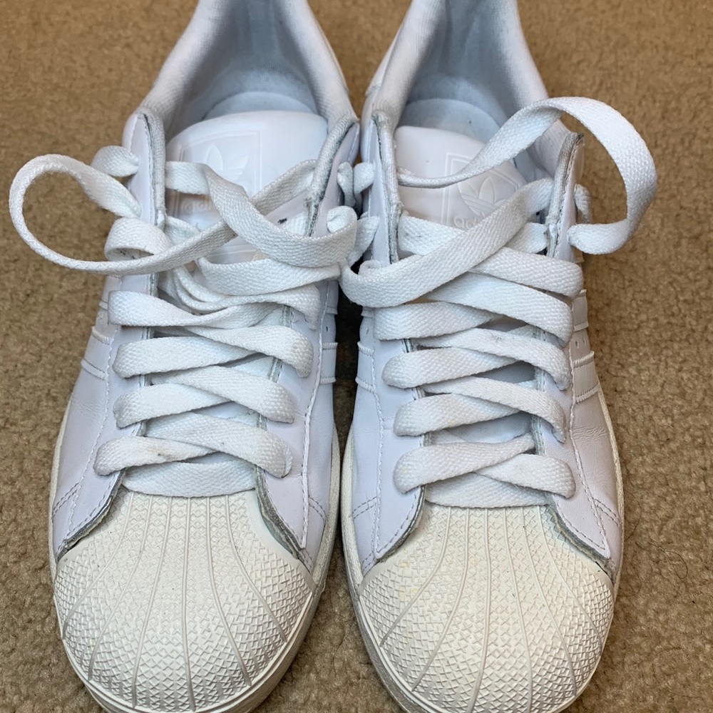 All white adidas shell toes